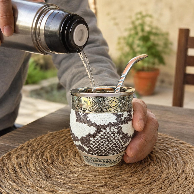 Mate gourd with bombilla and thermos pour