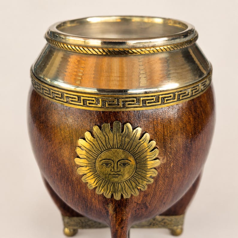 Mate cup rim with Greek key pattern and sun emblem