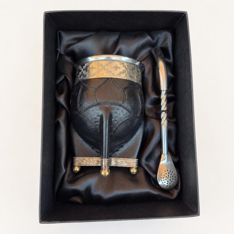 Black leather mate with silver ball feet