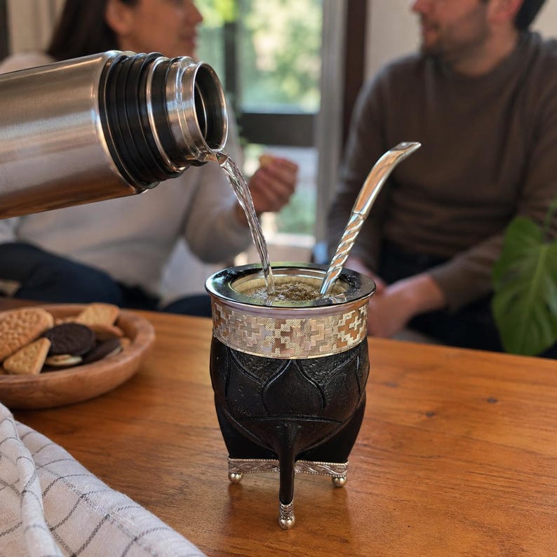 Mate gourd with bombilla and thermos pour