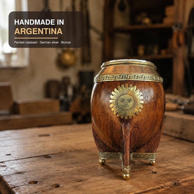 Painted calabash mate with bronze sun emblem, materials list