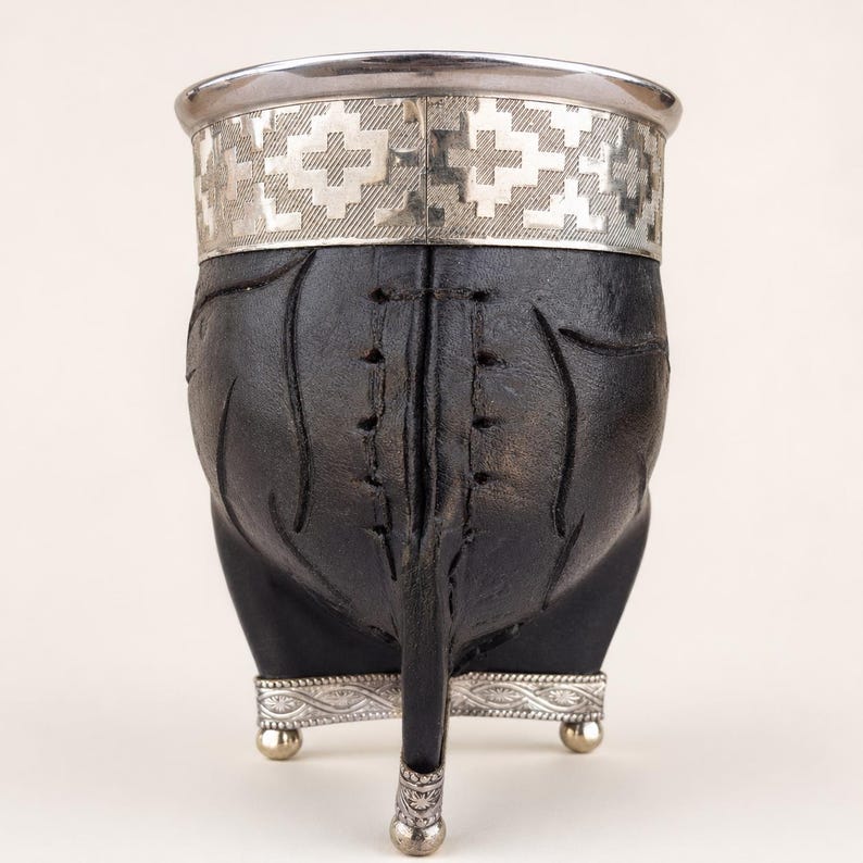 Black leather mate cup with carved details