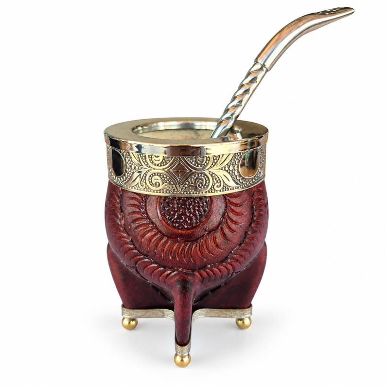 Reddish-brown leather mate with floral silver rim